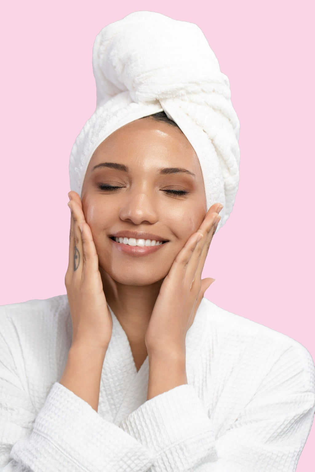 Model applying L.A. Girl Cleansing Oil during skincare routine