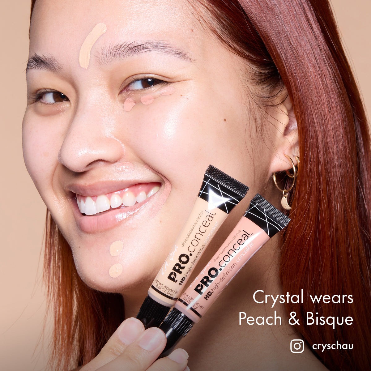 Crystal smiling and holding HD PRO.Conceal Peach and Bisque beside her cheek.