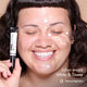 Jalisa smiling with HD PRO.Conceal White and Tawny dotted and striped across her face, holding a tube.
