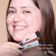 Brissa with HD PRO.Conceal Mint and Vanilla dotted beneath her eyes and on her forehead and chin, holding both tubes.