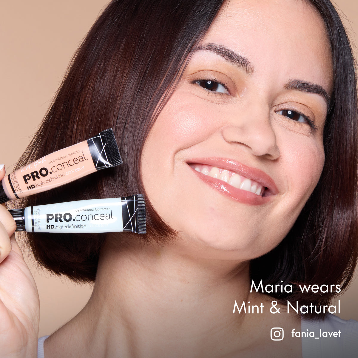 Maria smiling and holding HD PRO.Conceal Mint and Natural beside her cheek.