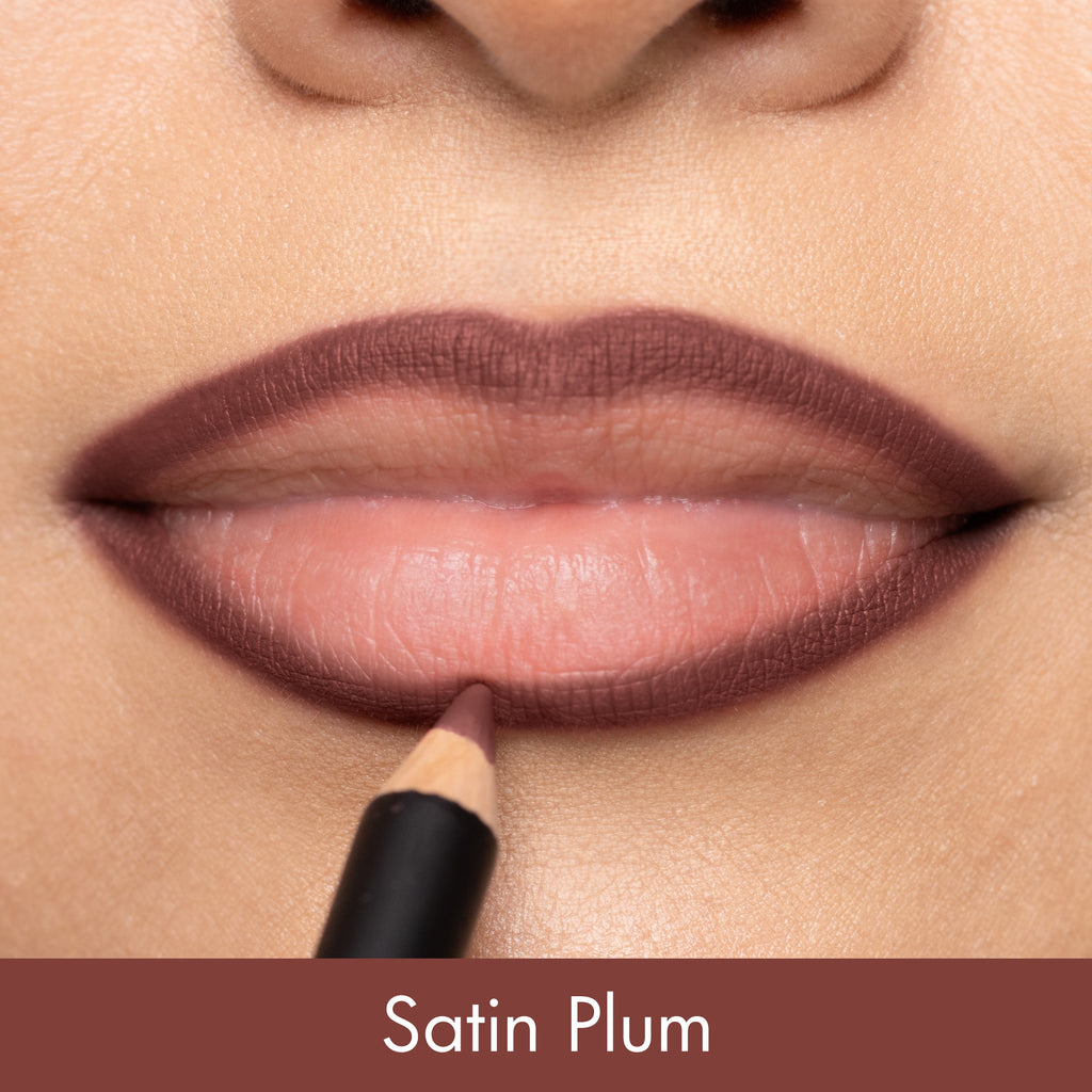 Lipstick being applied to lips with 'Satin Plum' color swatch