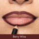 Lipstick being applied to lips with 'Berry Wine' color label