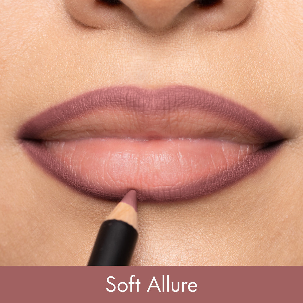 Lipstick being applied to lips with 'Soft Allure' color swatch