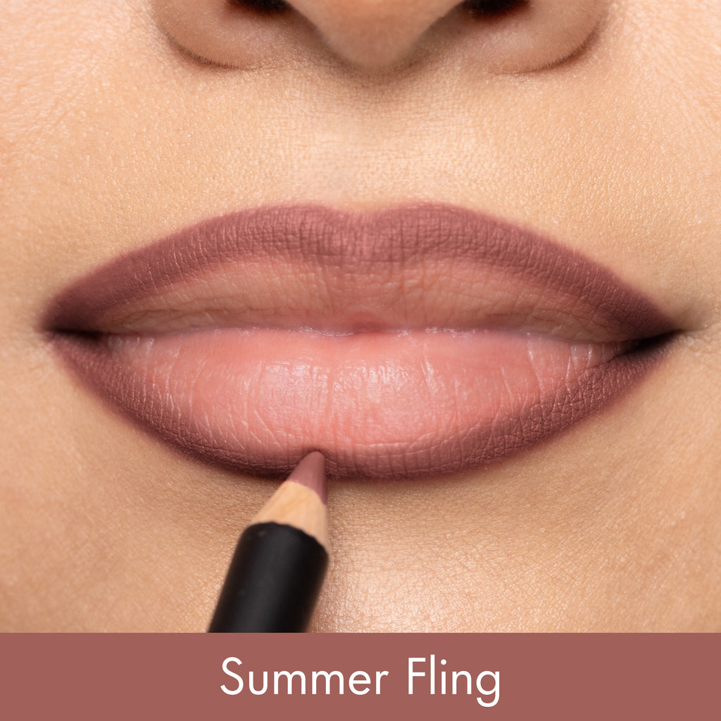 Lipstick application with 'Summer Fling' color on a neutral background