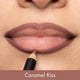 Lipstick being applied to lips with 'Caramel Kiss' color swatch