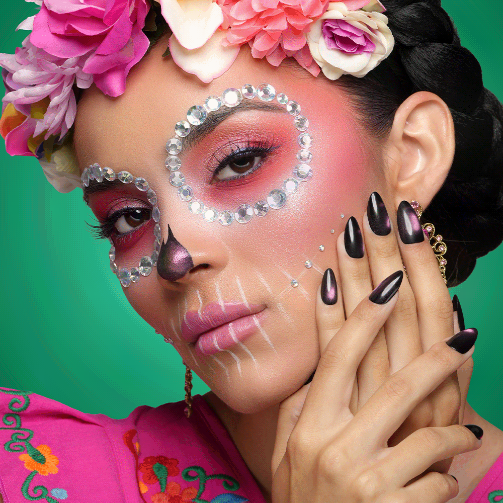 Model in Moonlit Bloom sugar-skull makeup wearing Moonlit Bloom Luxe Shine Nail Fave nail tips